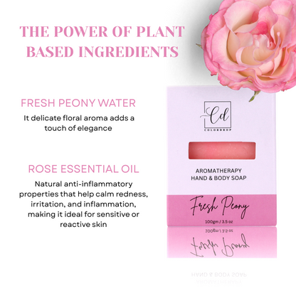 Aromatherapy hand and body soap with plant-based ingredients, featuring a pink rose and text about fresh peony water and rose essential oil.